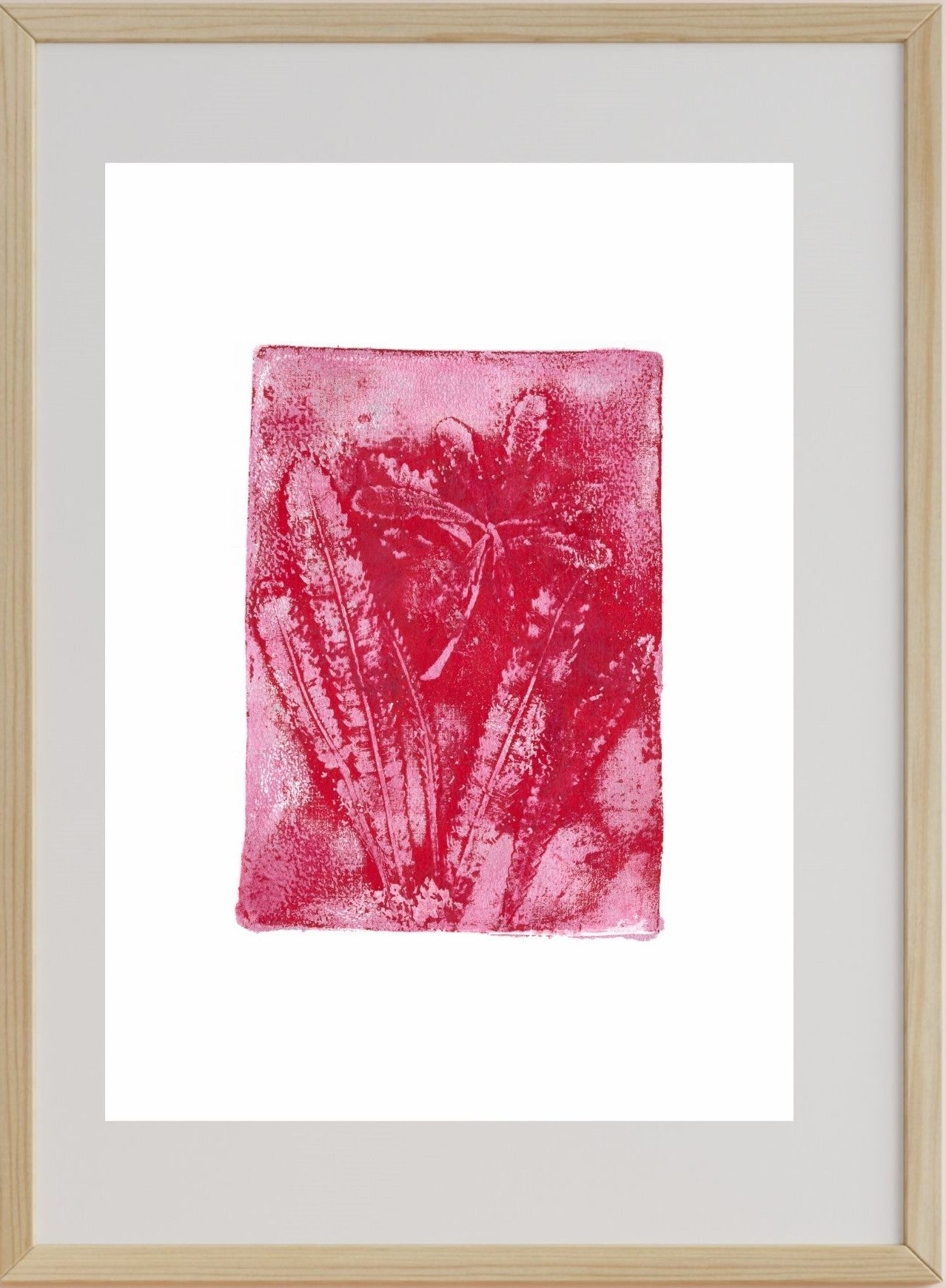 A framed artwork print of silver and red banksia leaves.