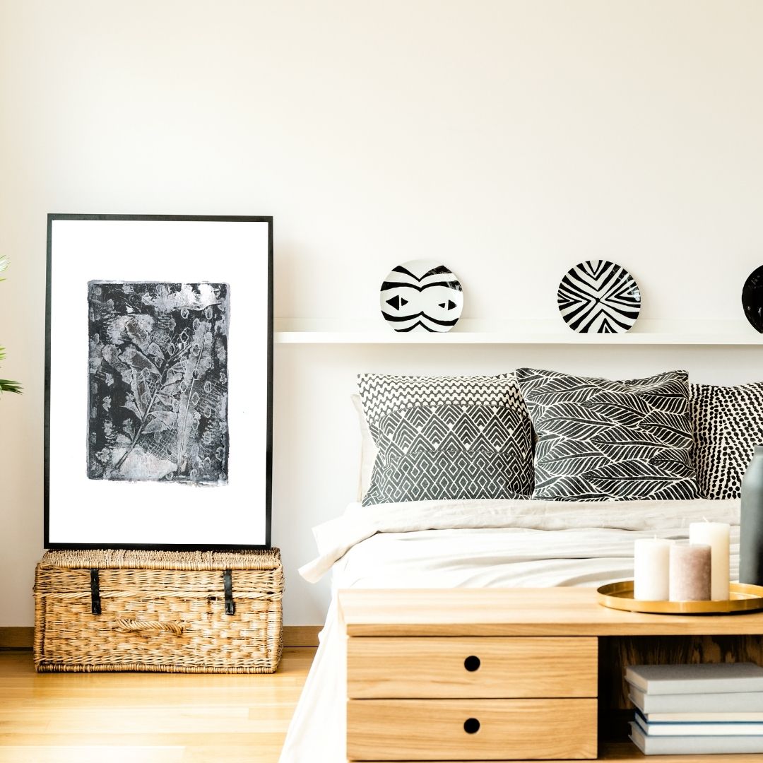 Bedroom interior styled with monochromatic art