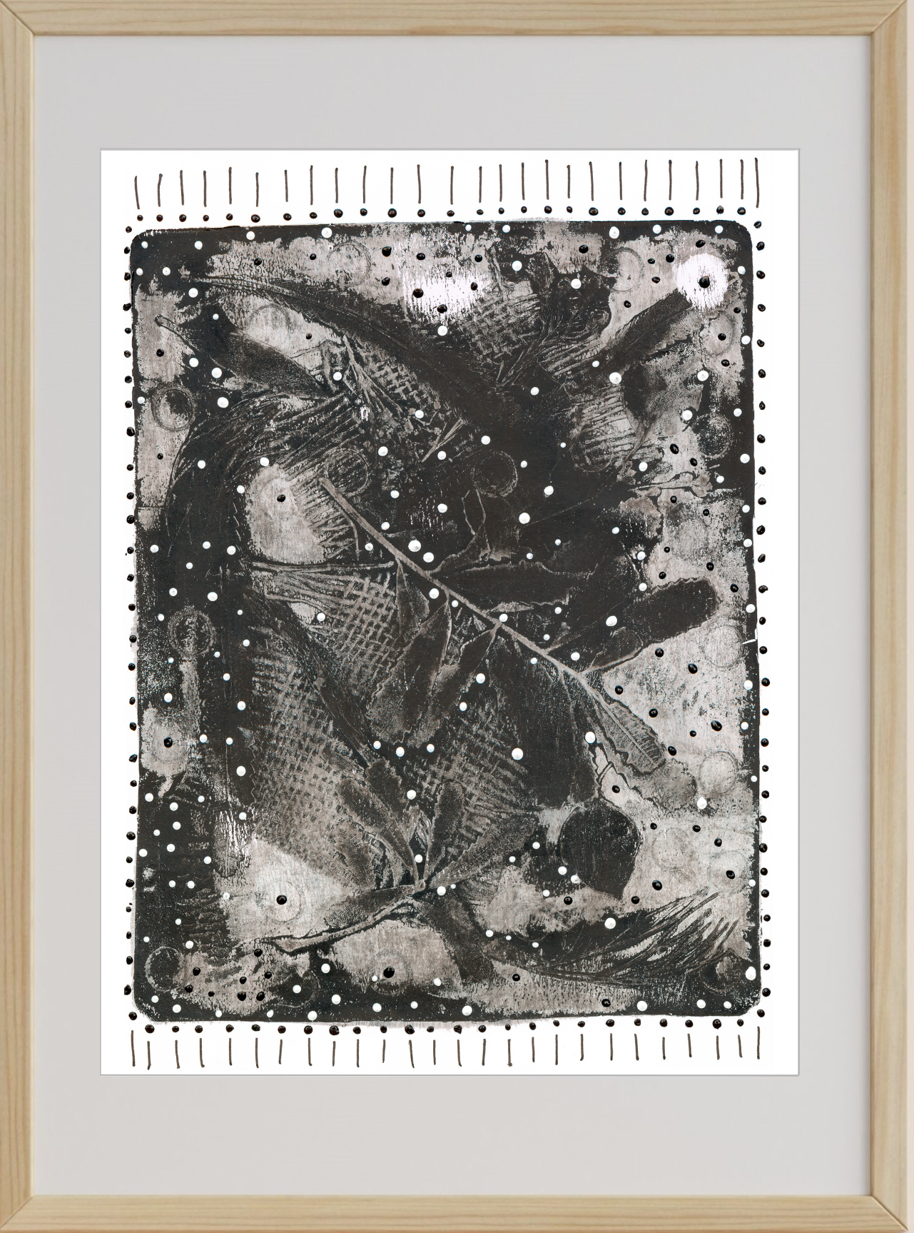 Framed black and white abstract artwork with a light wood frame.