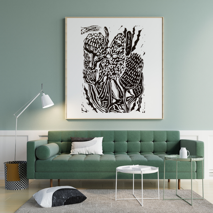 Modern living room with a green sofa, abstract artwork on the wall, and a lamp.