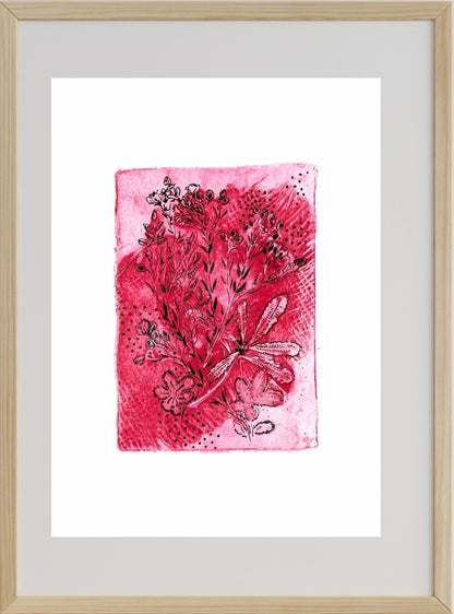 A framed artwork featuring a pink gel monoprint with floral patterns on paper.