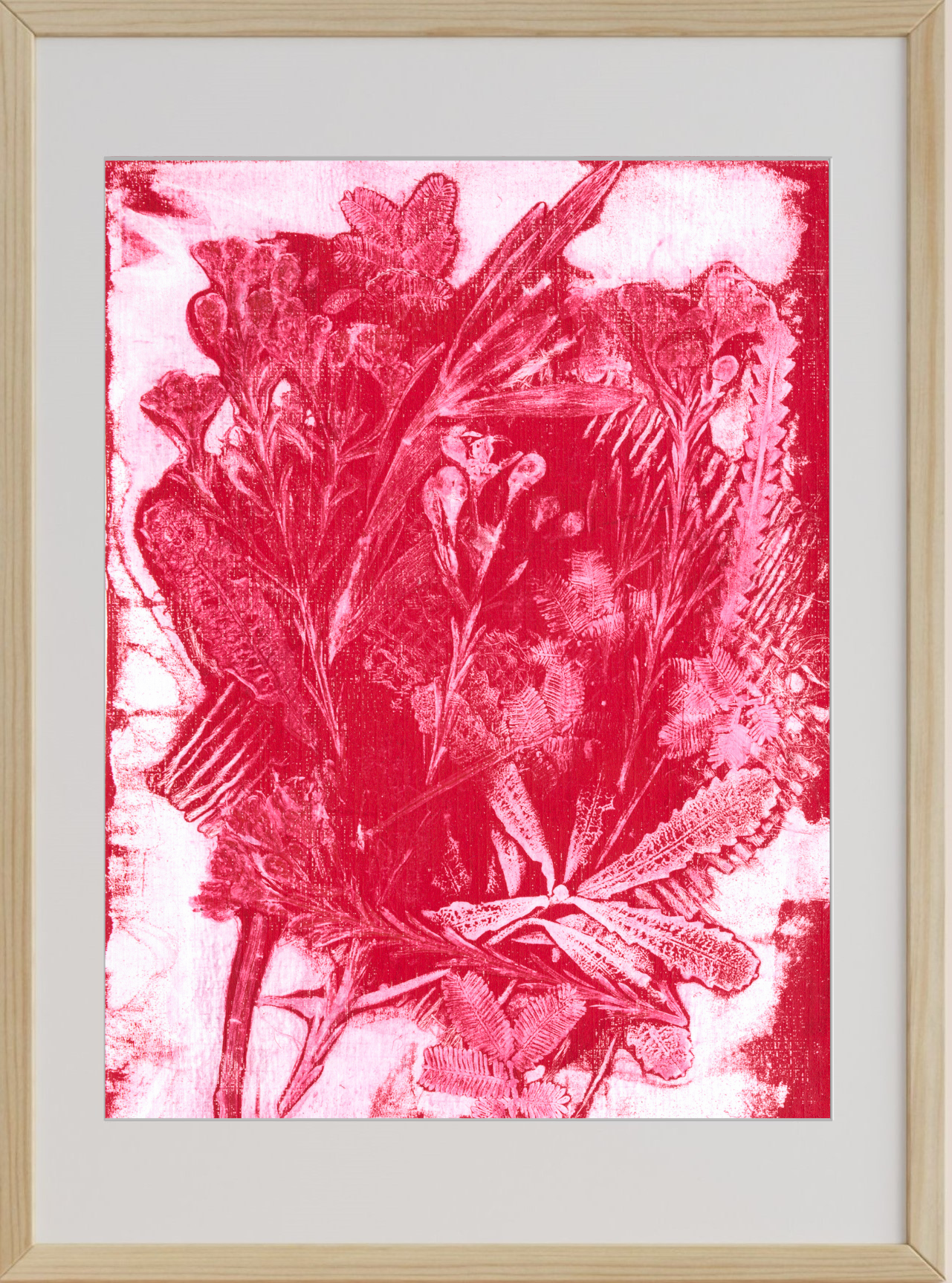 Framed artwork with red floral design on a white background