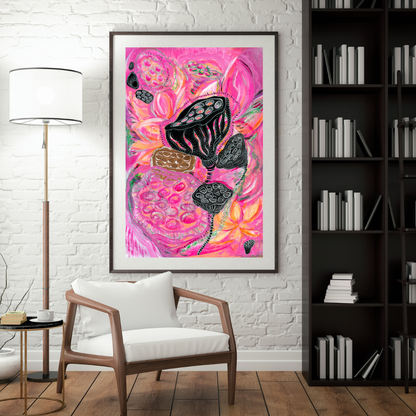 Framed abstract artwork with pink and black colors in a living room setting.