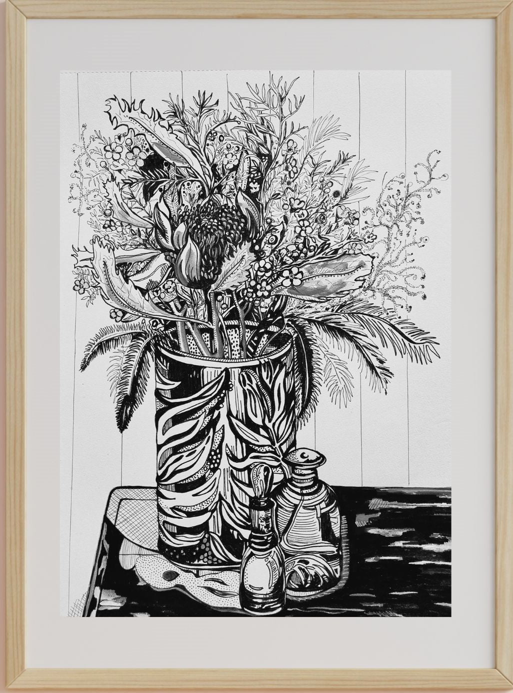 A black and white ink pen drawing of a still life scene with flowers in a vase, accompanied by a perfume bottle and foliage, set against a white background.